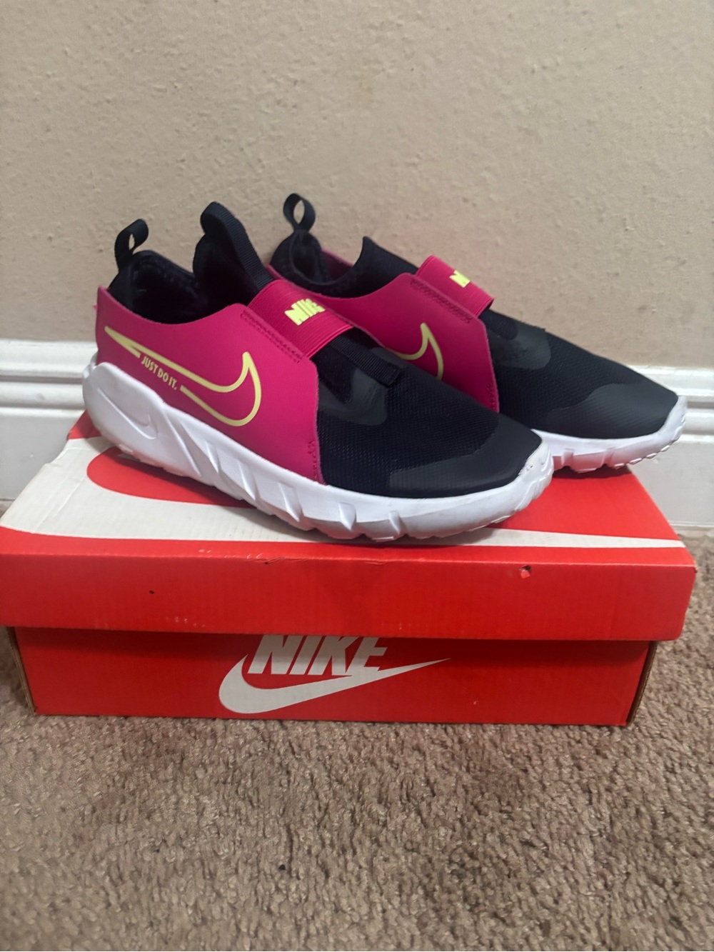 Nike Kids Slip-On Sneakers in Black, Pink & Gold